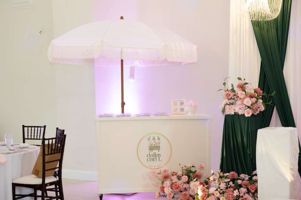 Dallas Cartl styled candy cart with fresh flowers at a Dallas–Fort Worth event
